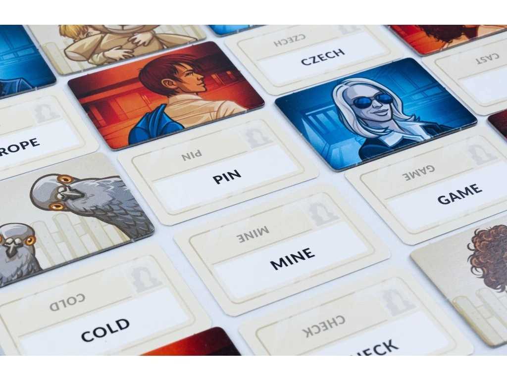 Board game cards with various images and text on a white surface