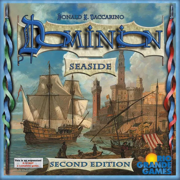 Board game box for 'Dominion Seaside' with ships and castle illustration
