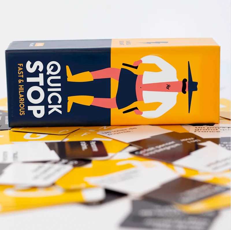 Quick Stop game box with cards on a light background