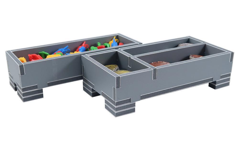 Gray plastic toy storage unit with colorful toys on a white background