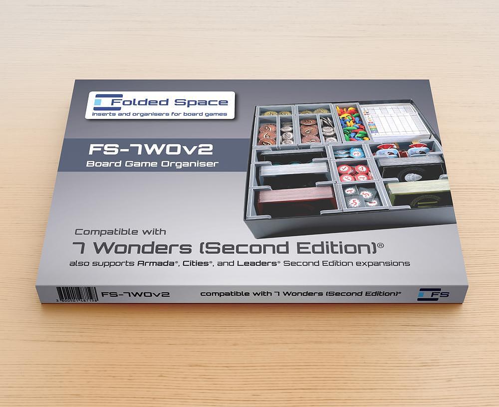Board game organizer packaging for '7 Wonders' on a wooden surface