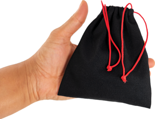 Black drawstring bag with red strings held in a hand on a white background
