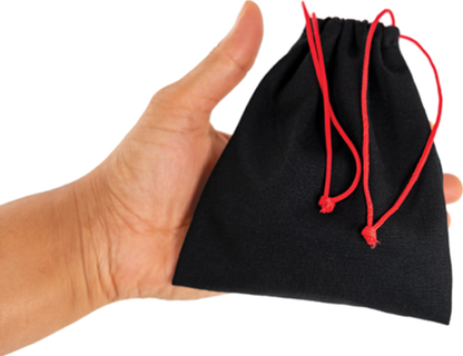 Black drawstring bag with red strings held in a hand on a white background