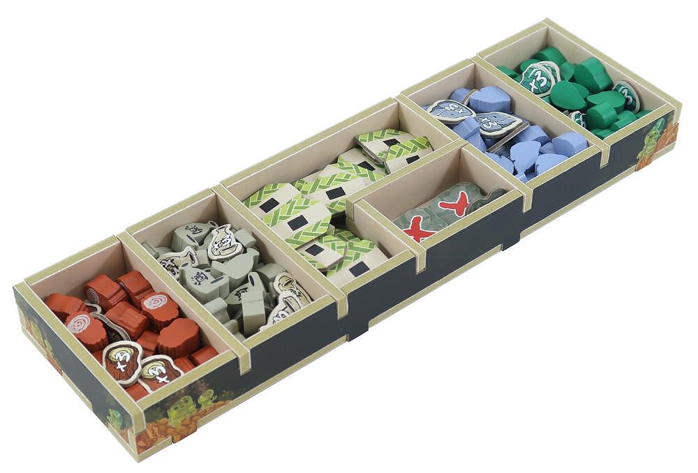 Set of colorful wooden blocks in a storage box on a white background
