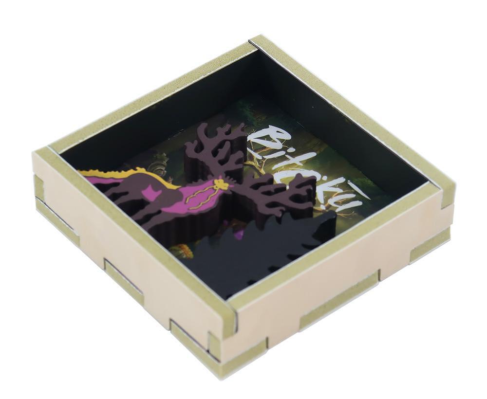 Decorative box with a purple leaf design and 'Bilakku' branding on a white background