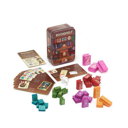 Board game components including cards, tiles, and a tin labeled 'Bookshelf' on a white background