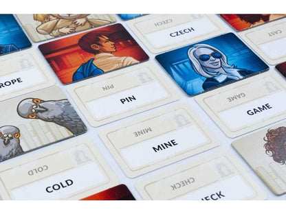 Board game cards with various images and text on a white surface