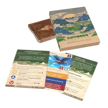 Card game with cards and a box labeled 'Earthborne Adventures' on a white background