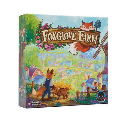The board game box for 'Foxglove Farm' by Shawn & Alyn, published by Paragon. The packaging features a colorful, whimsical illustration of a fox farmer pushing a cart next to a windmill, with the game title displayed prominently at the top.