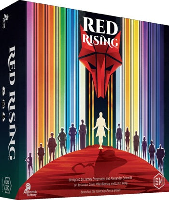 Board game box for Red Rising, featuring a colorful rainbow-striped background, a large red mask graphic, and silhouettes of figures walking toward a central white figure on a red path. Visible brands include Automata Factory and GM.
