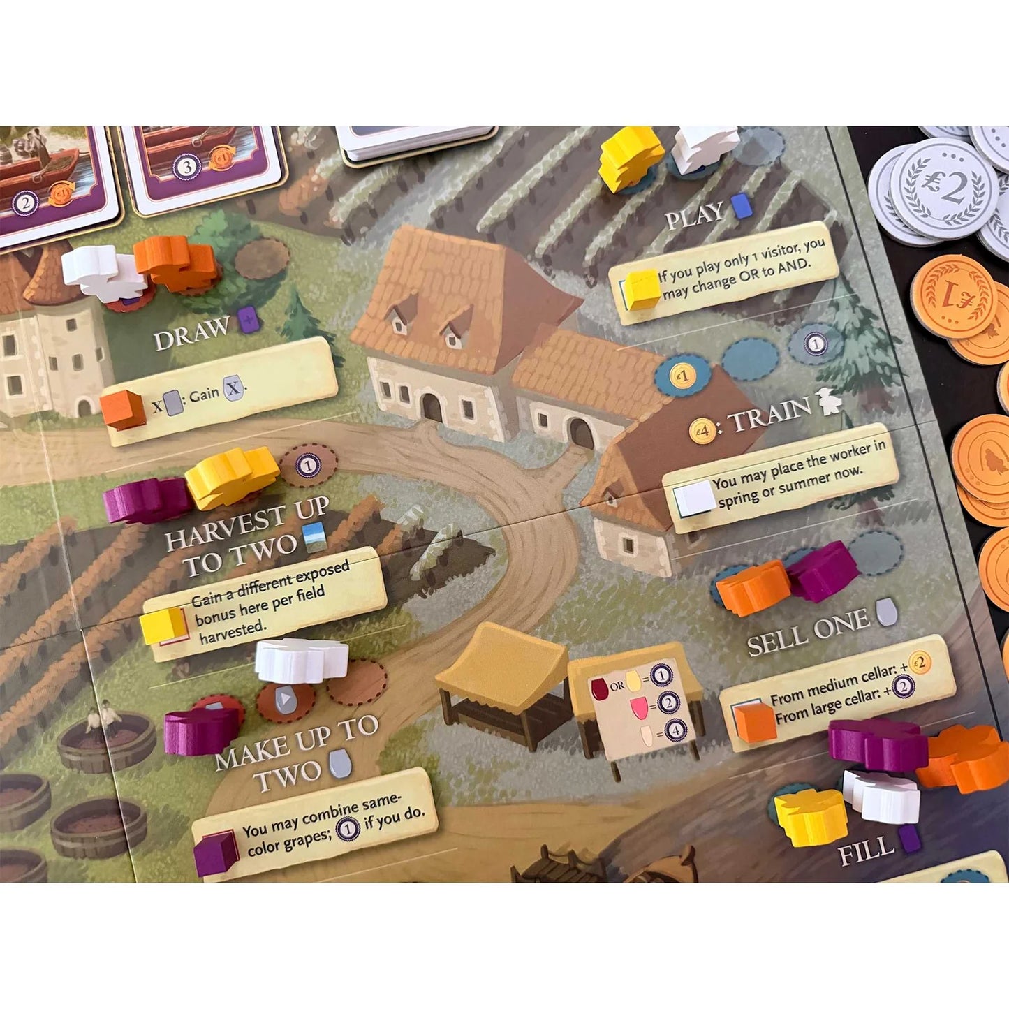Board game setup with colorful pieces and instructions on a table