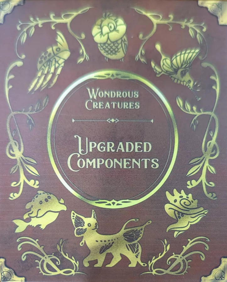 Decorative box with gold illustrations and text on a red background