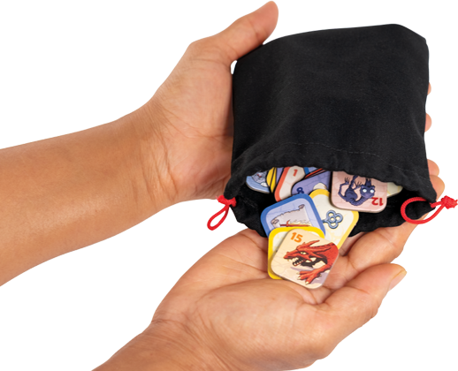 Black drawstring bag with colorful game cards held by a hand on a white background