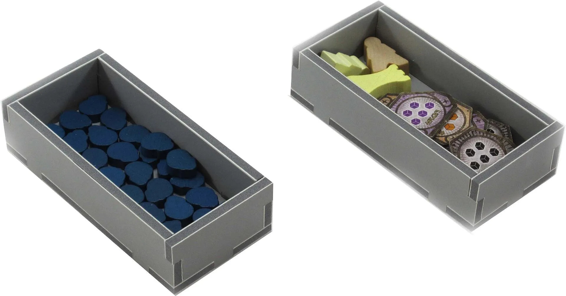 Two gray storage boxes with dice and game pieces on a white background