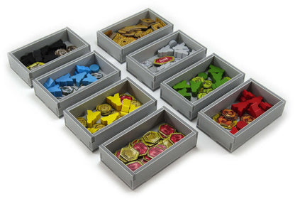 Gray storage boxes with colorful contents on a white background