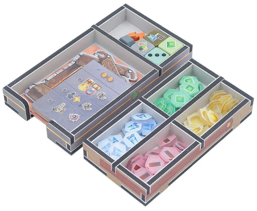 Storage box with compartments containing various small items on a white background
