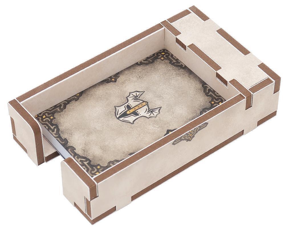 Cardboard game mat with embossed design and logo on a white background