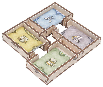 Card game box with four compartments containing cards with cartoon characters on a white background