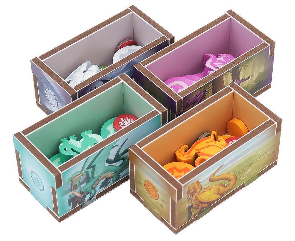 Four colorful toy storage boxes with illustrations on a white background
