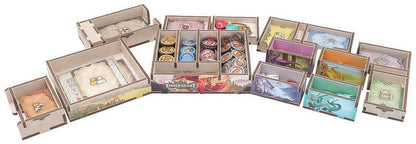 Collection of small decorative boxes with various designs on a white background