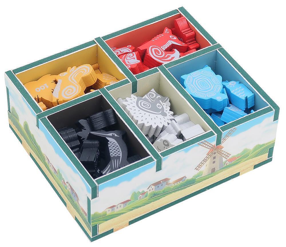 Colorful wooden puzzle box with compartments containing various shaped wooden pieces.