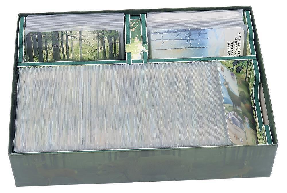 Collection of cards in a green box with scenic images on the cover