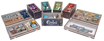Collection of board game boxes with various designs and colors on a white background
