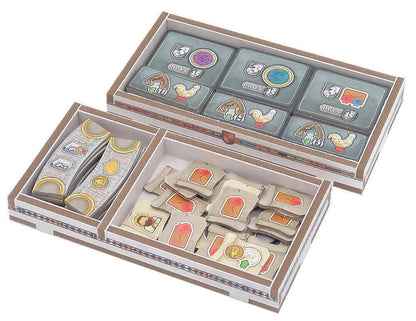 Set of wooden stamps with colorful designs in a box on a white background