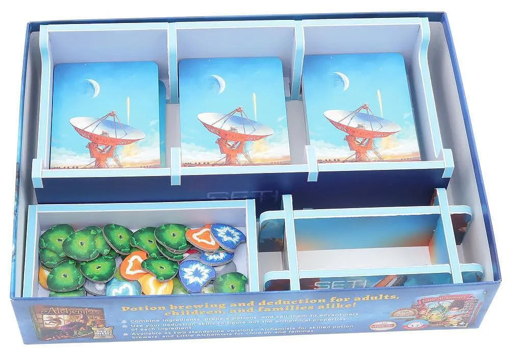 Board game box with cards and game pieces on a white background