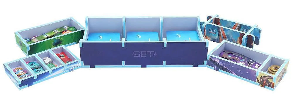 Settlers of Catan game box with compartments open on a white background
