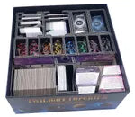 Card game box with Twilight Imperium branding, containing various cards and components.