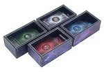 Four colorful compact discs in their packaging on a white background