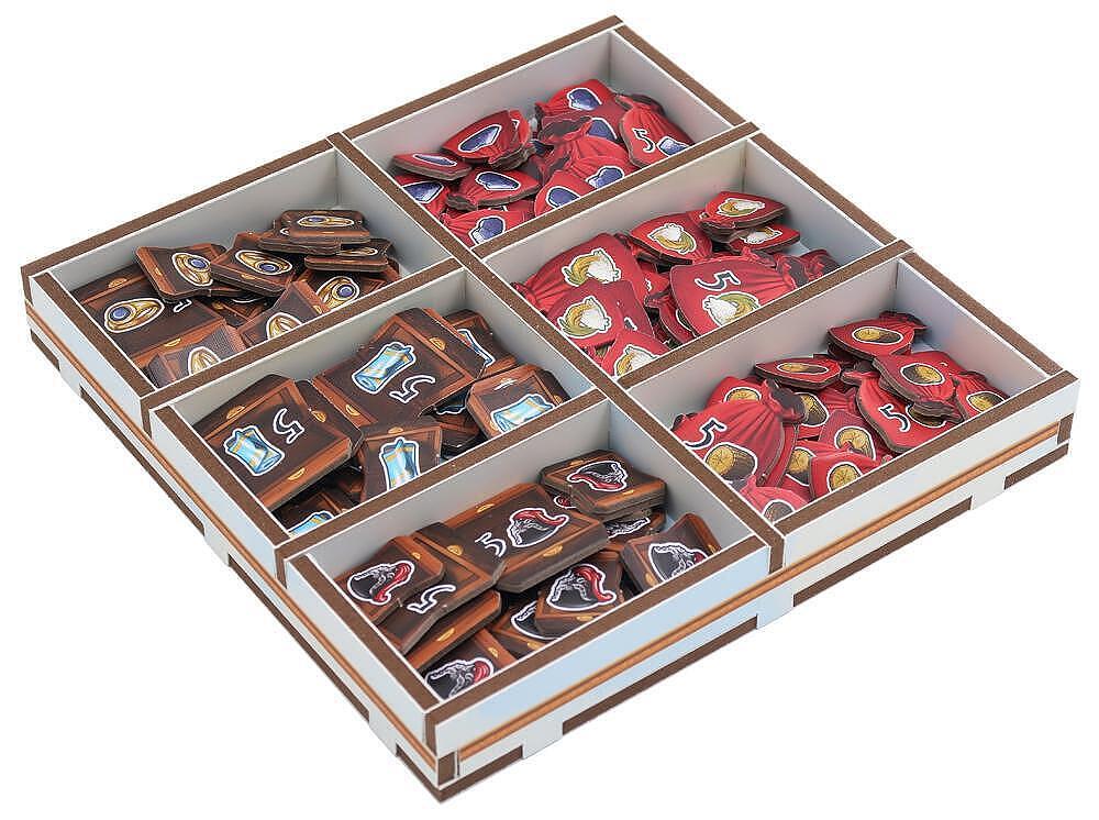 Divided display case with red and brown items arranged in sections.