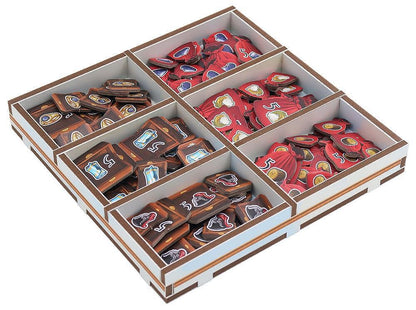 Divided display case with red and brown items arranged in sections.