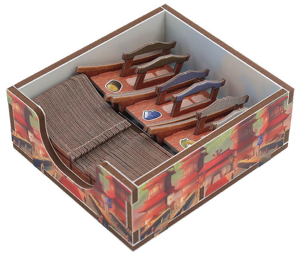 Set of miniature wooden boats in a decorative box